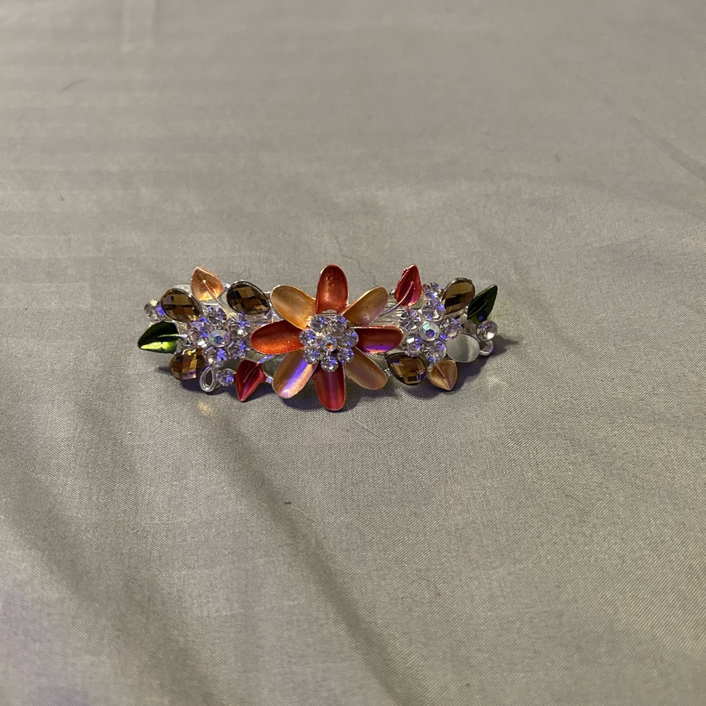 Metal hair piece.